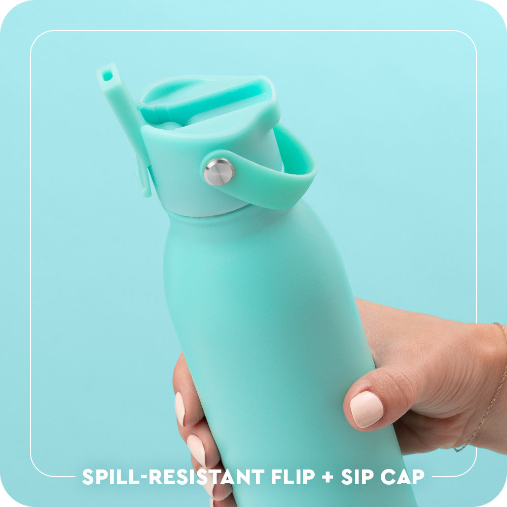 Spill-resistant Flip + Sip Cap with inner straw